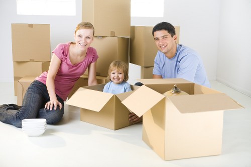 Professional flat removals in Customhouse with packing and moving boxes