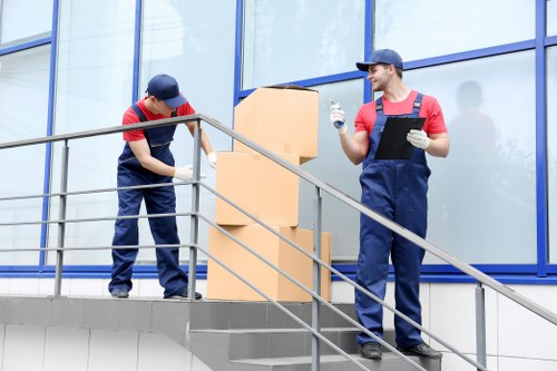Professional removals team planning a move in Customhouse