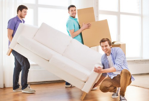 Customhouse moving team loading items near East London properties